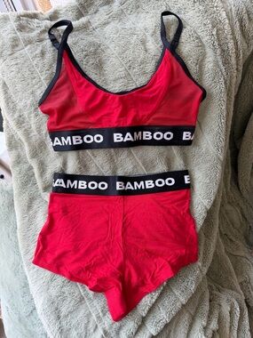 BAMBOO Red boy shorts with Black band never worn